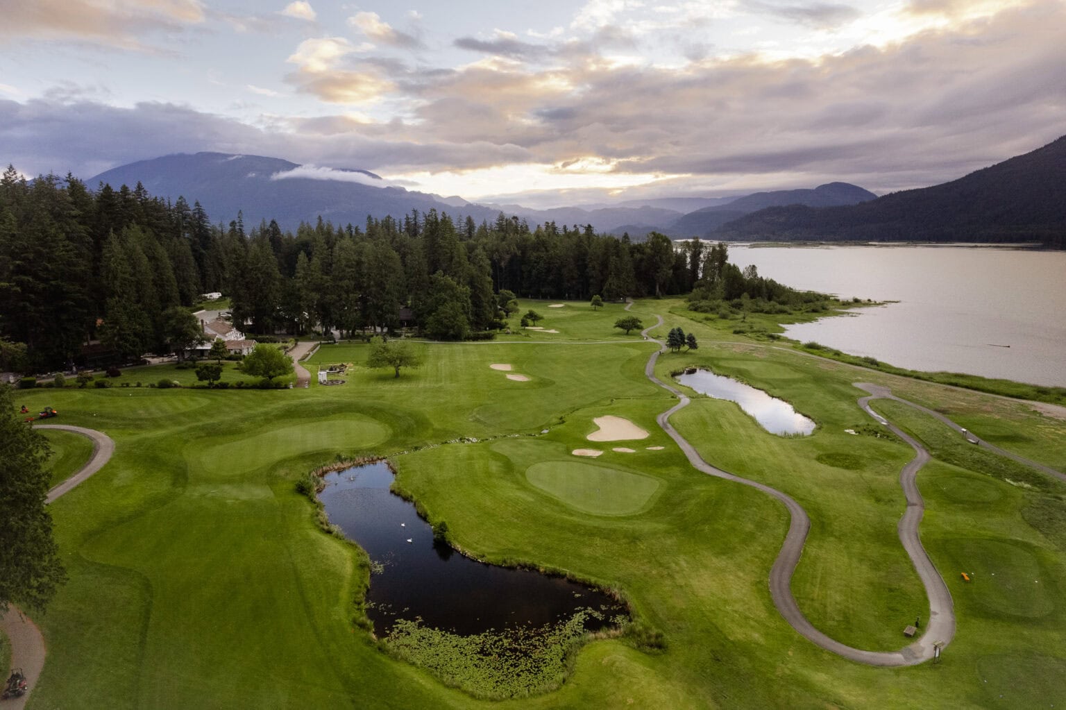 Sandpiper Resort's golf course beside the Harrison River and mountains