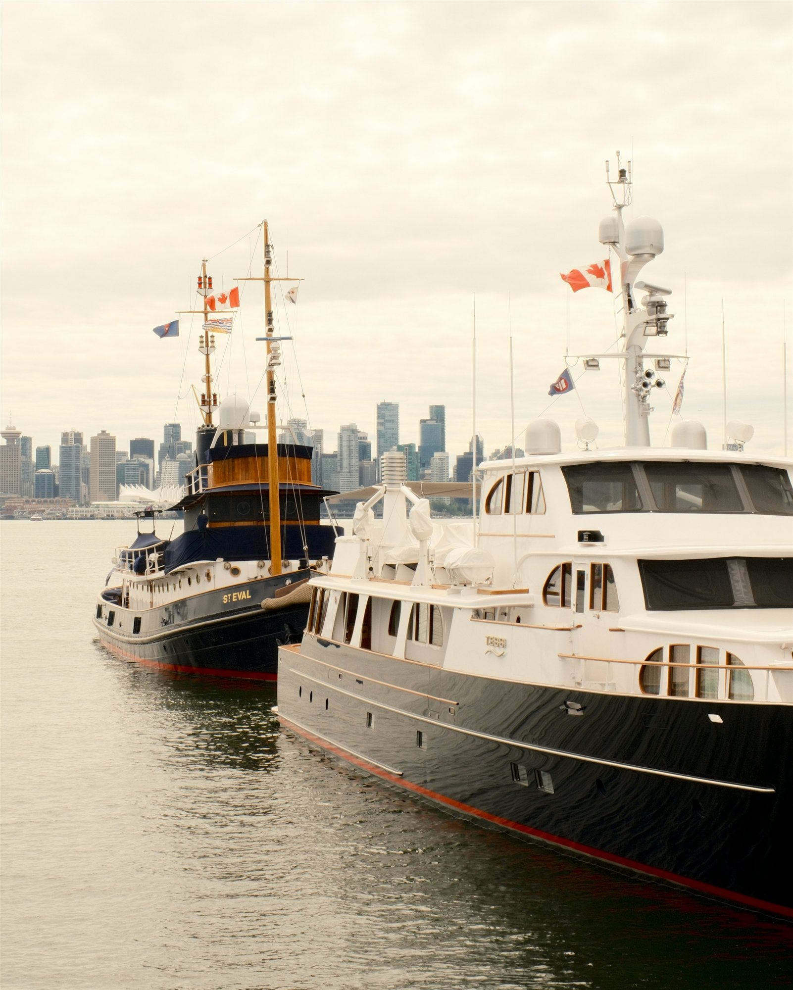Boats at Lonsdale Quay with the Vancouver skyline across the harbour